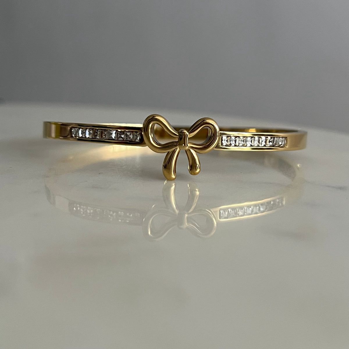 BOW STUDDED CUFF