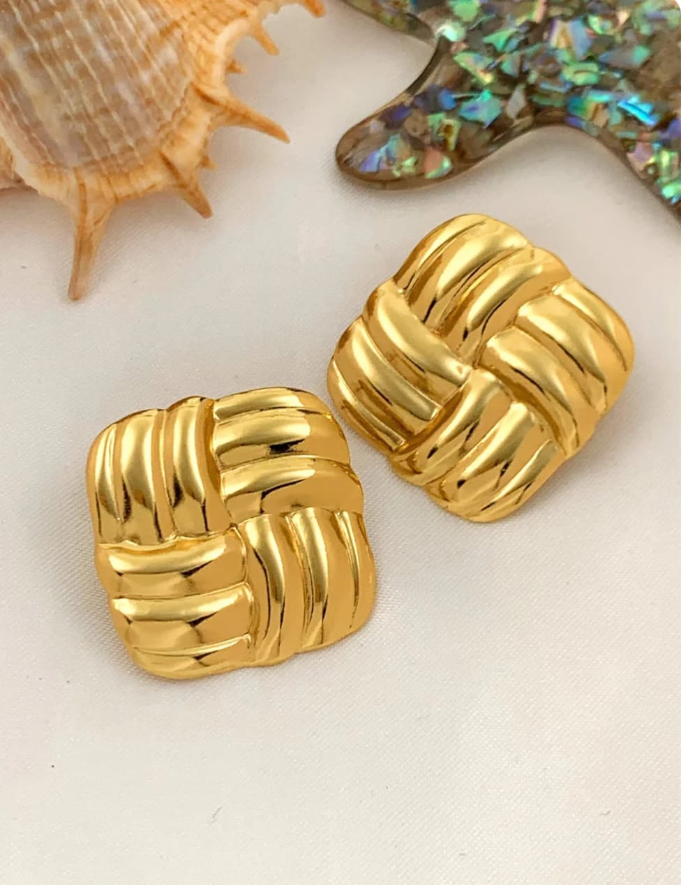 Bold criss cross earings